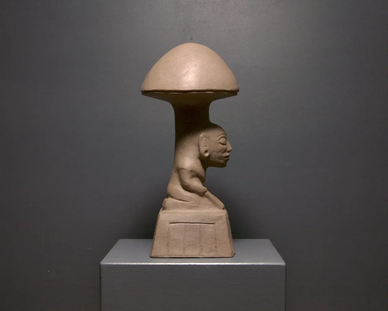 Woman with Metate, side view